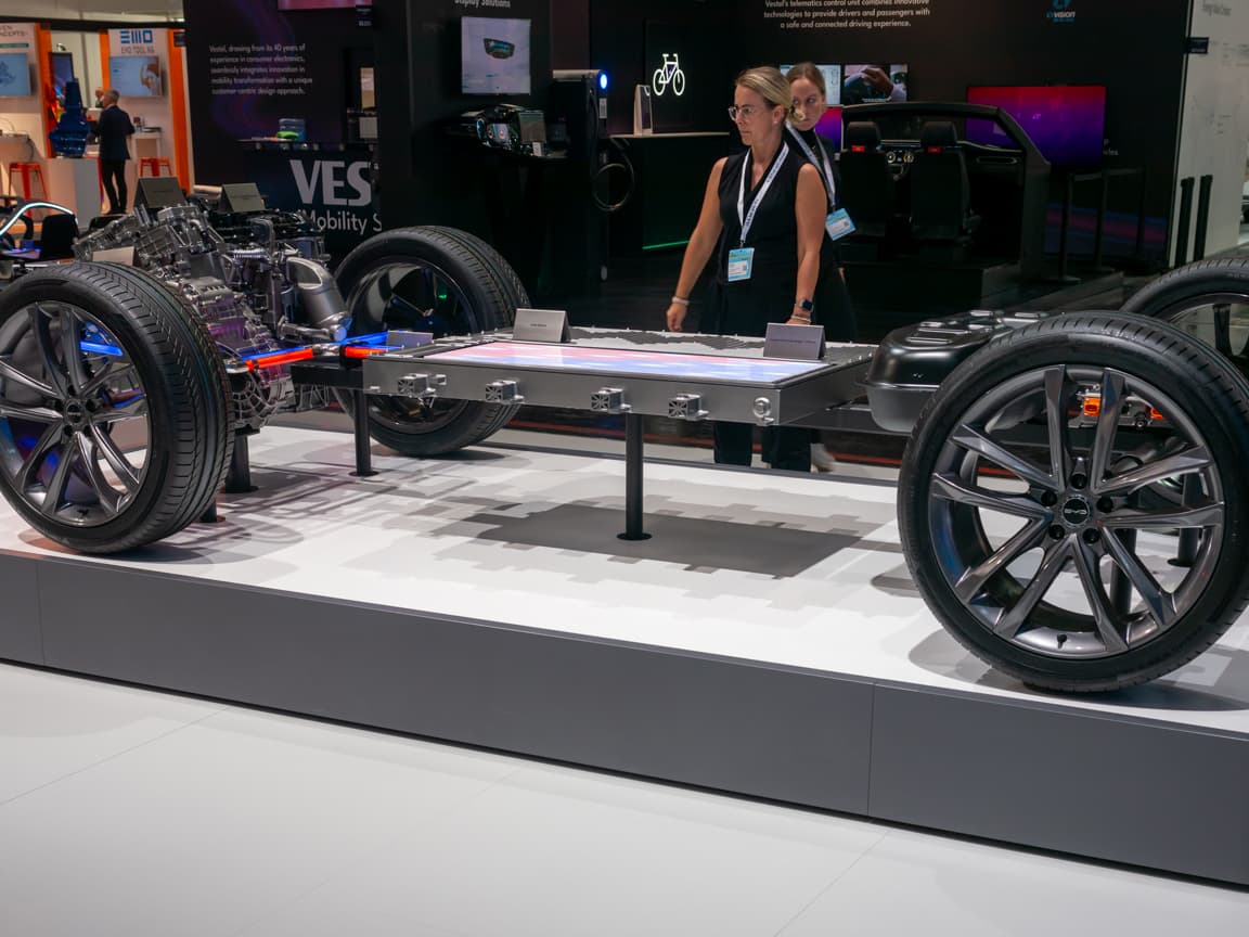 EV skateboard chassis with flat cell-to-pack battery integrated into the floor, on display at IAA Summit 2023 in Munich