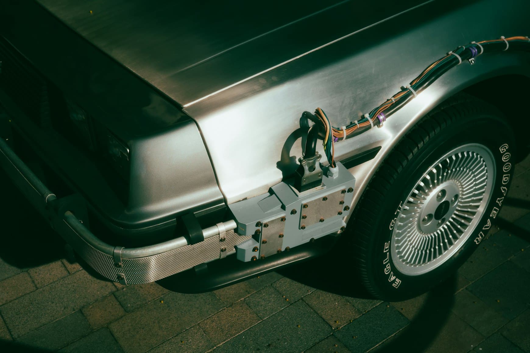 EV conversion build showing motor controller electronics and wiring mounted on a classic car
